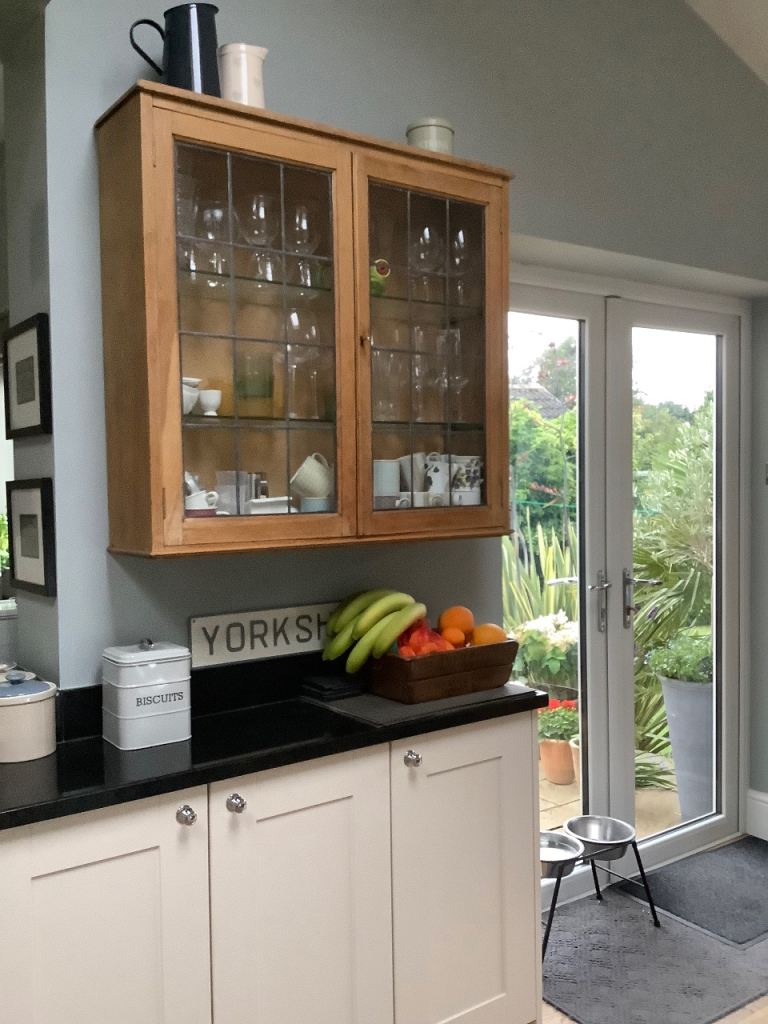 Stripped and waxed oak wall cabinet