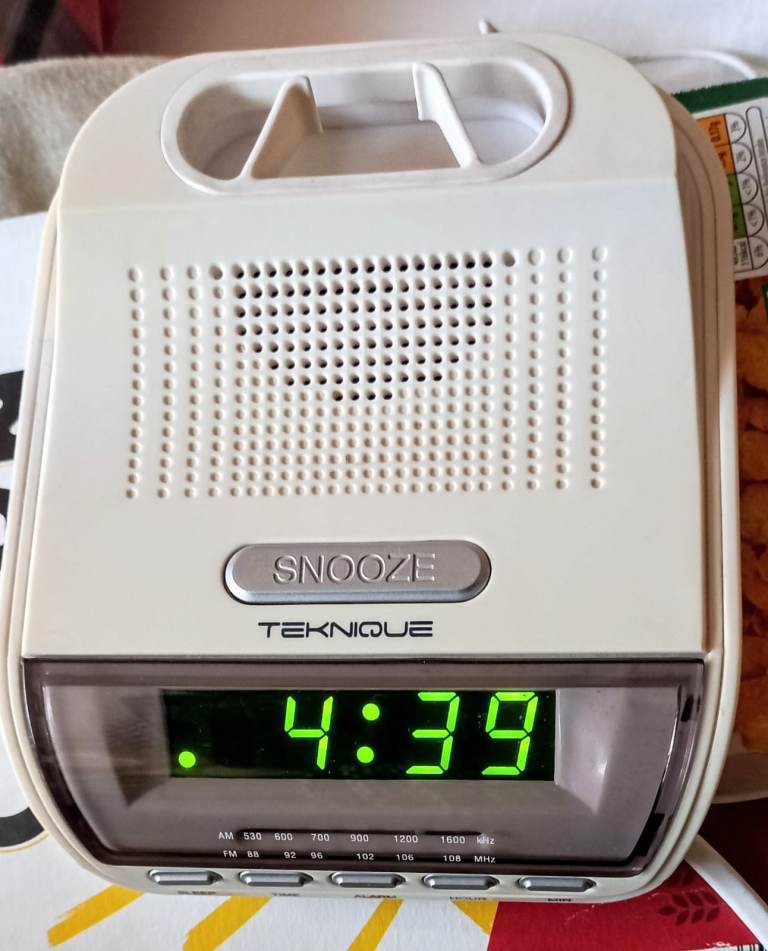 1 Electric/Battery Alarm Clock Radio 