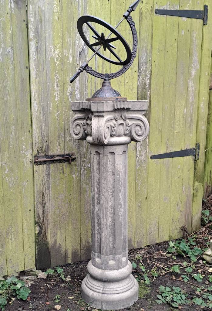 Large stone and cast iron garden armillary sundial