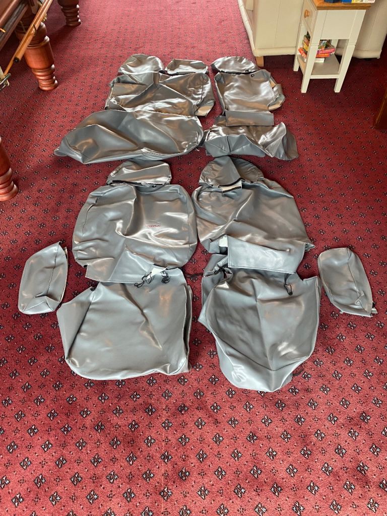 Genuine Mitsubishi full set of heavy duty washable seat covers in grey. 