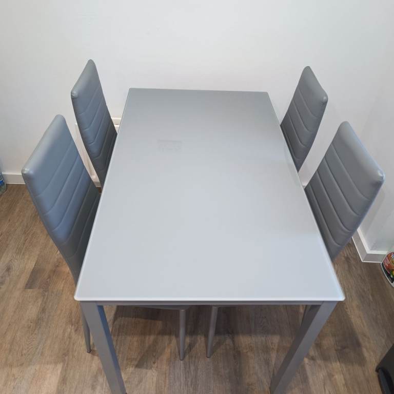 Glass Dining Table & 4 Grey Chairs – Excellent Condition