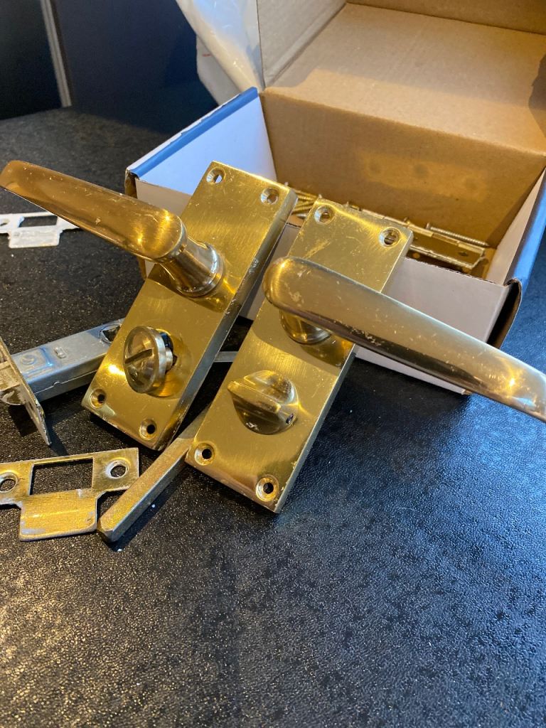 Brass locking bathroom door handles