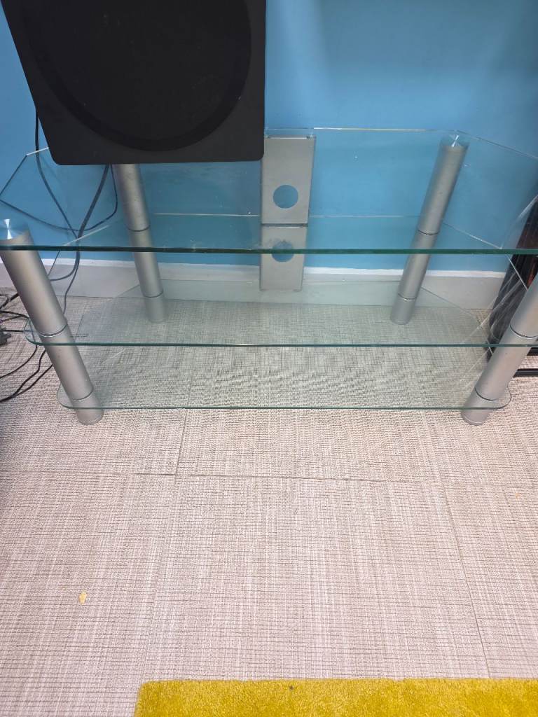 Clear Glass TV Stand with Silver Legs – Good Condition