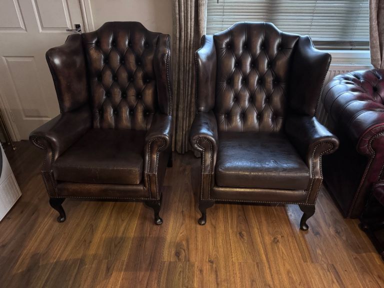 Pair of chesterfield vintage brown wingbacks armchairs 