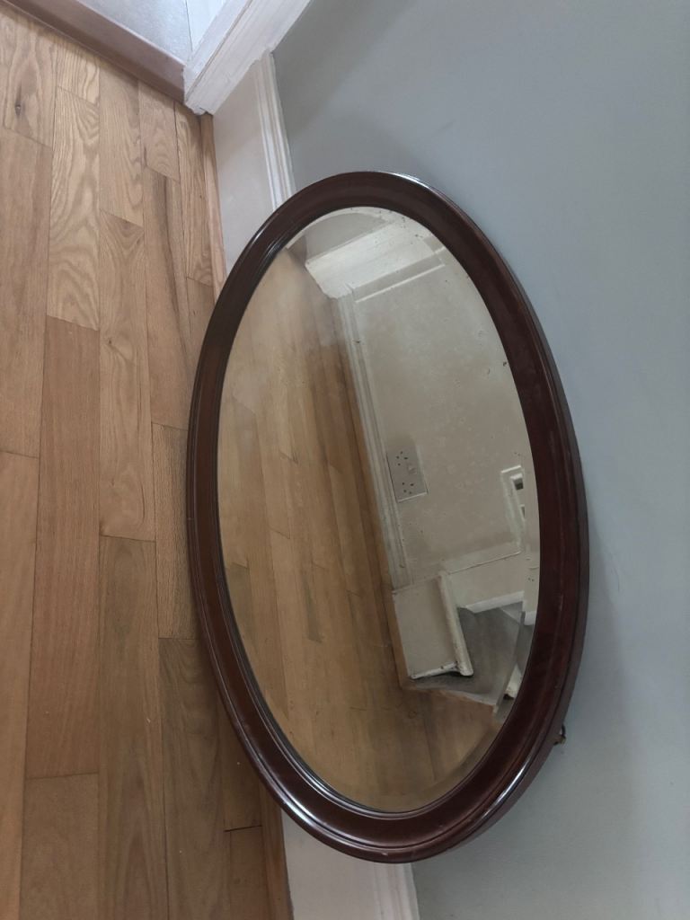 Antique mahogany oval mirror