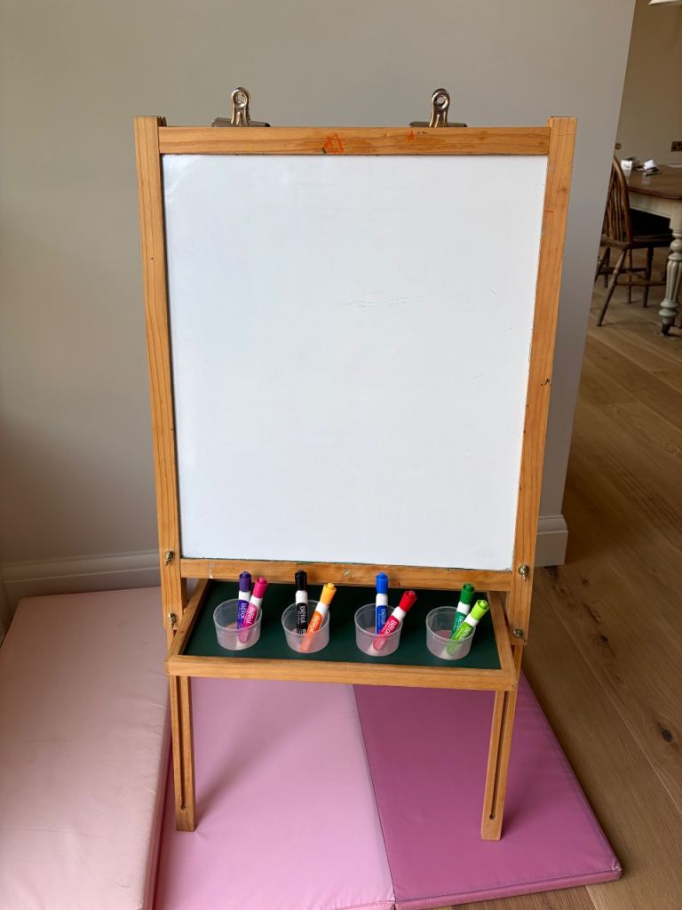 Children’s easel with whiteboard and chalkboard