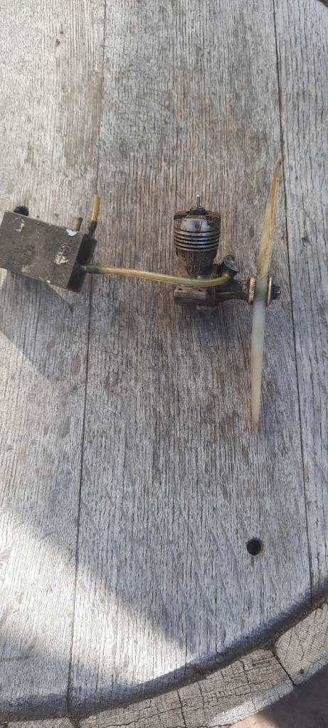 Radio controlled Enya 0.9 glow engine and fuel tank 