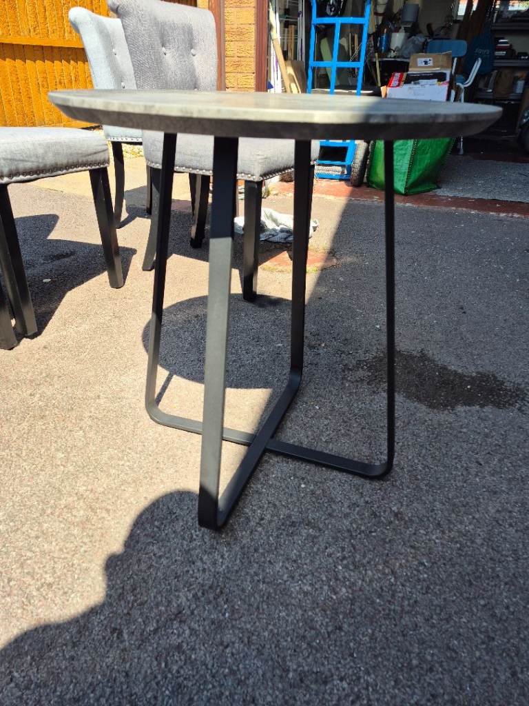 Round Grey Table with Black Metal Legs