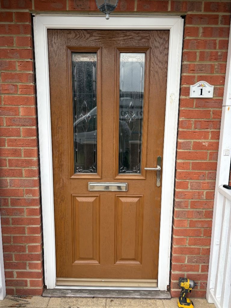 Good Condition Brown Composite Front Door