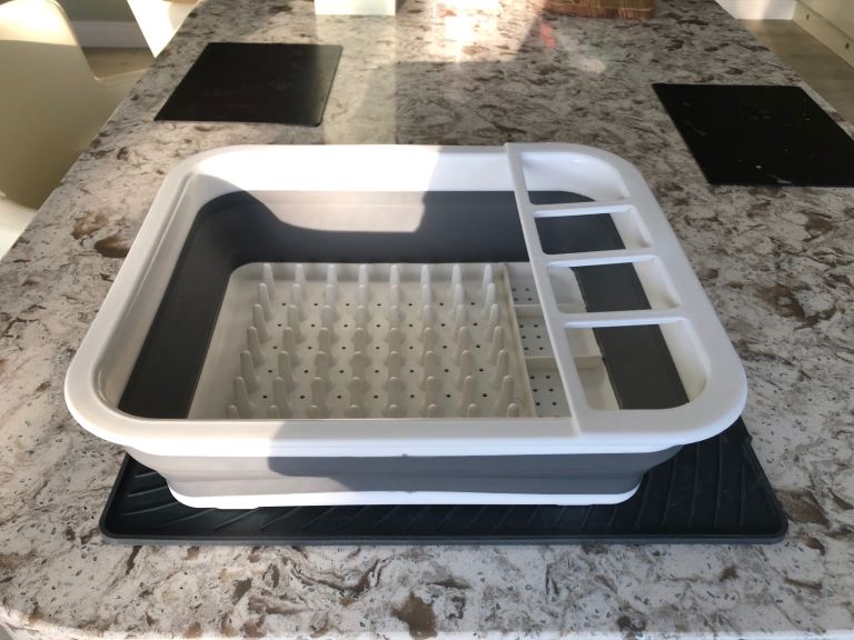 Pop up washing up bowl with rubber mat