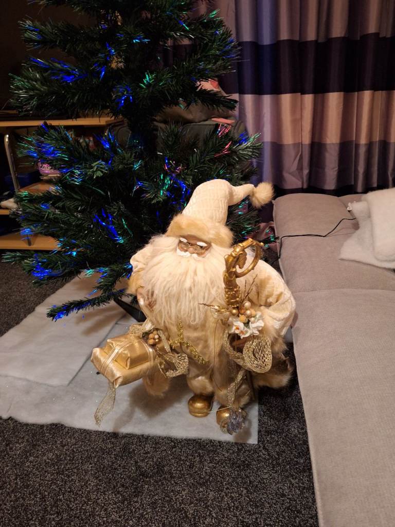 Cream  and Gold standing Santa
