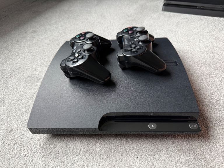 Sony PlayStation 3 Console with 2 Controllers and Call of Duty