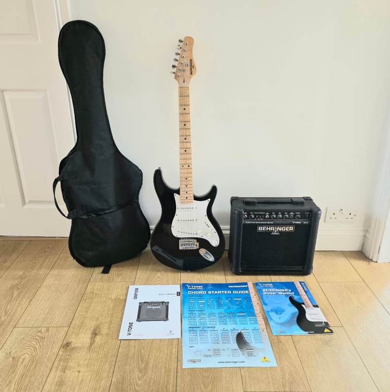 Behringer V-Tone GM108 Electric Guitar & GM108 Amplifier. Complete with Guitar bag and books.