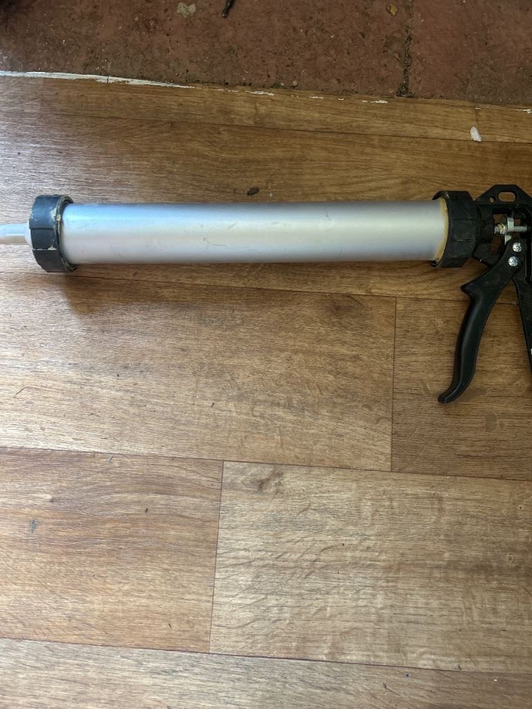 Good Condition Caulking Gun - Silver and Black