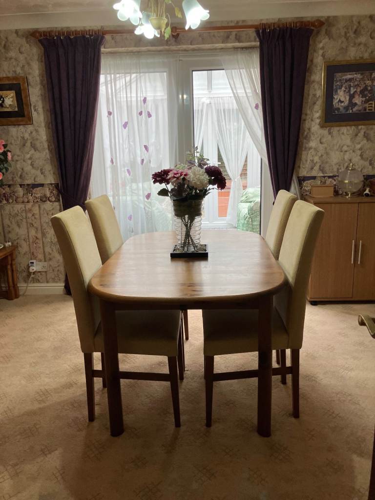 solid oak extendable dining table and chairs