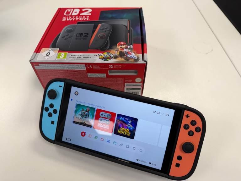 Nintendo Switch 2, like new, fully boxed, includes Dbrand Killswitch Case