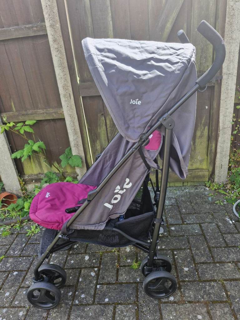 Collapsible buggy like new with rain covers
