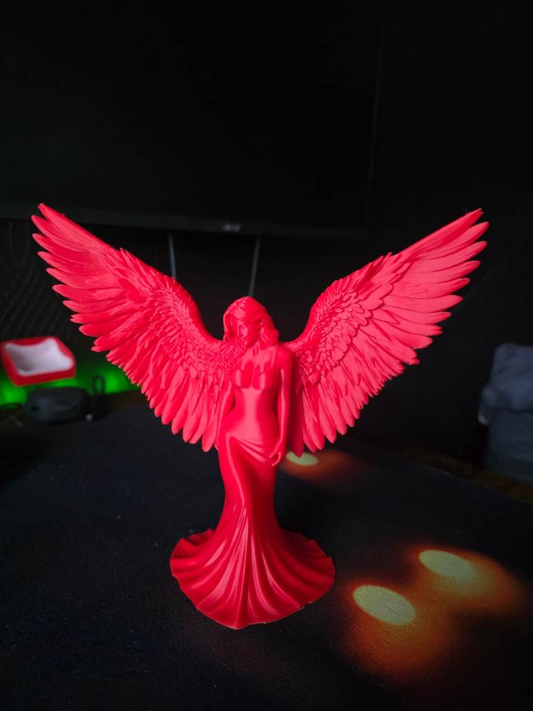 Striking Red Angel Figurine – Excellent Condition
