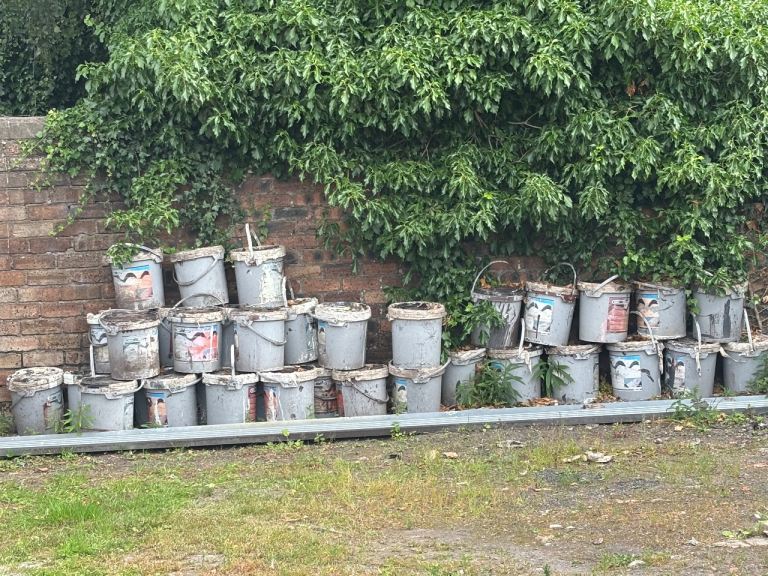 Lots large tubs of 'Roof Paint' 