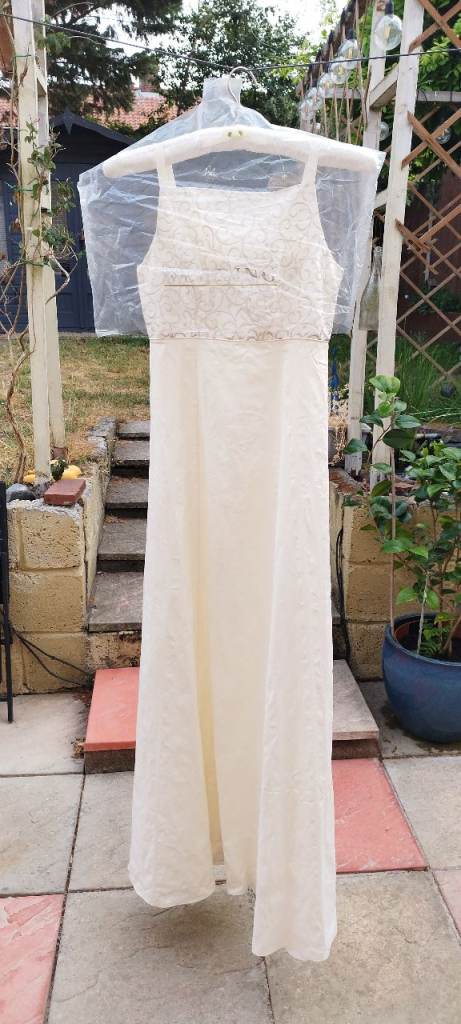 Ivory wedding dress. 