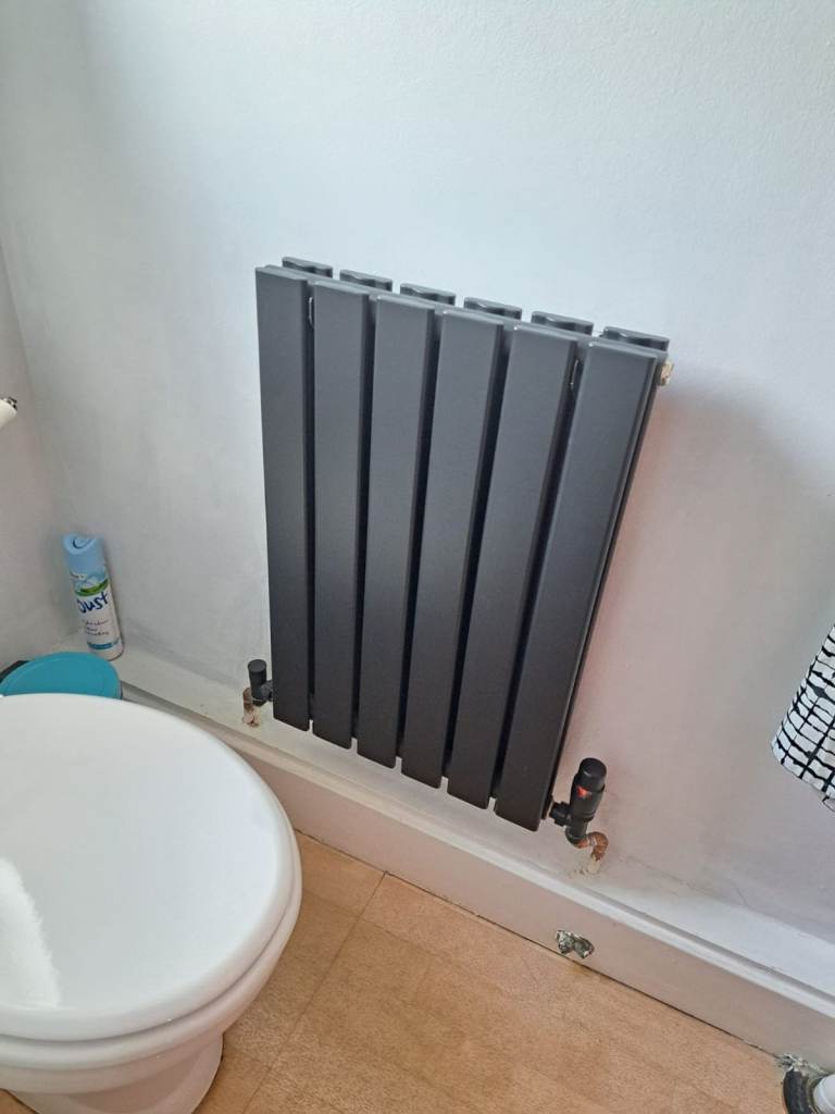 Brand new black radiator in box unopened 63.5cmx42cm