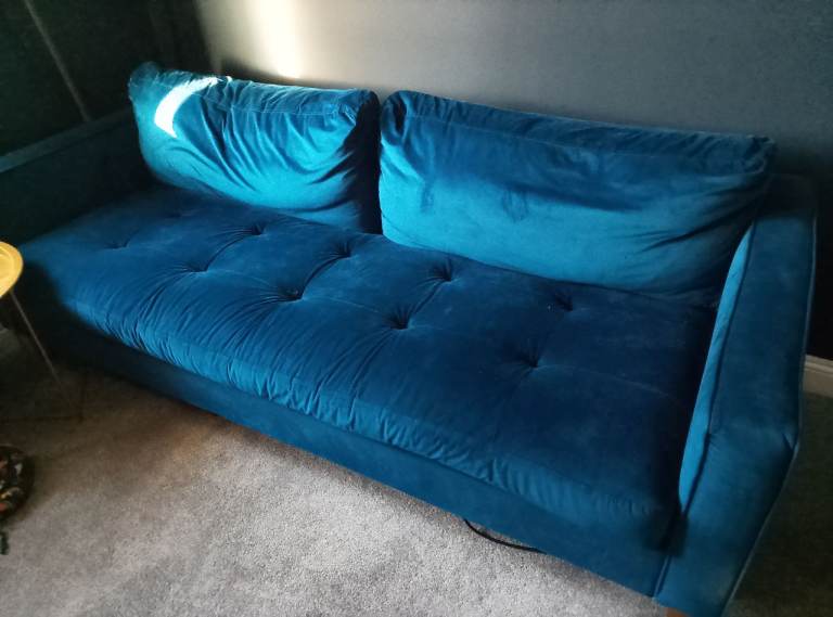 Blue velvet sofa
