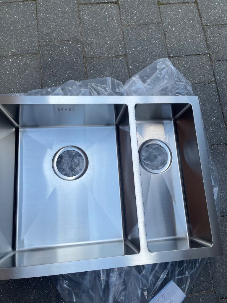Stainless steel underneath inset sink 