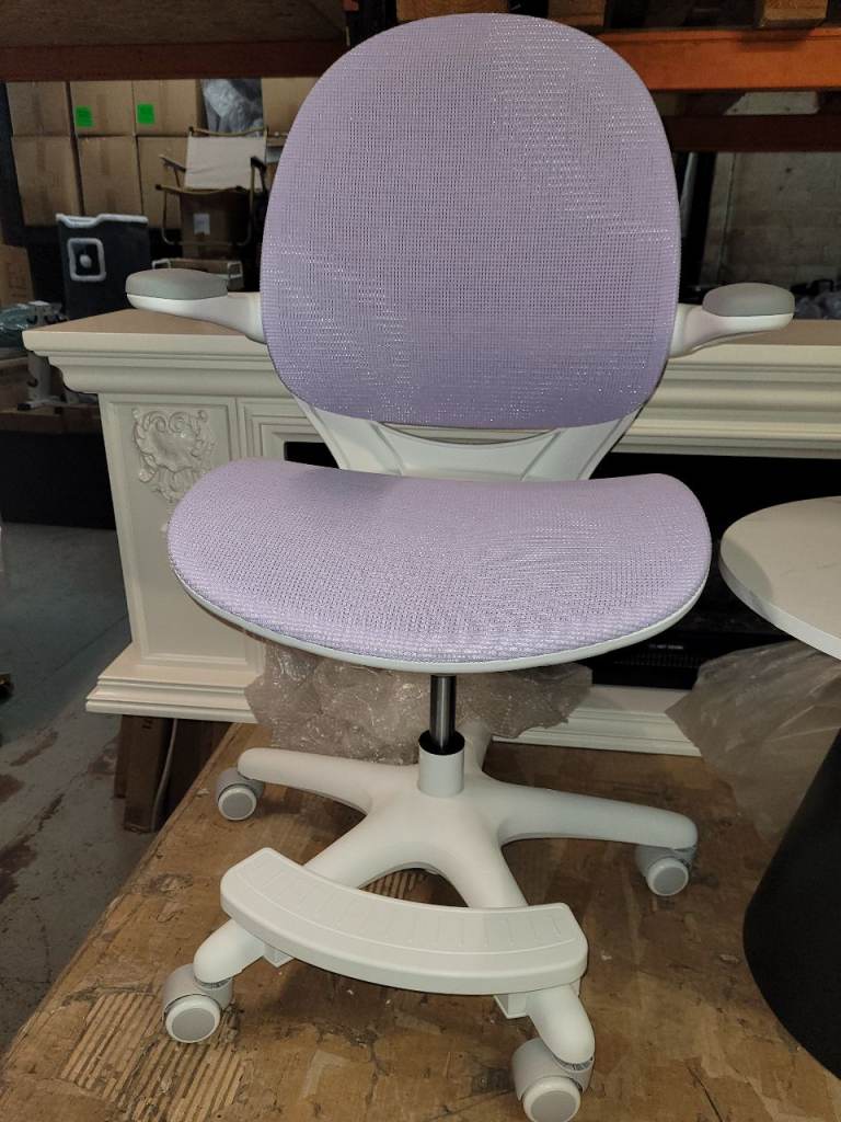 A new childs swival chair in blue / purple it is  Fully adjustable As they grow 