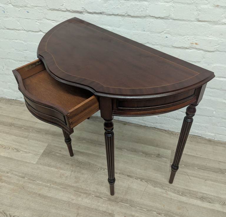 Reproduction mahogany half moon hall table by J Sydney Smith
