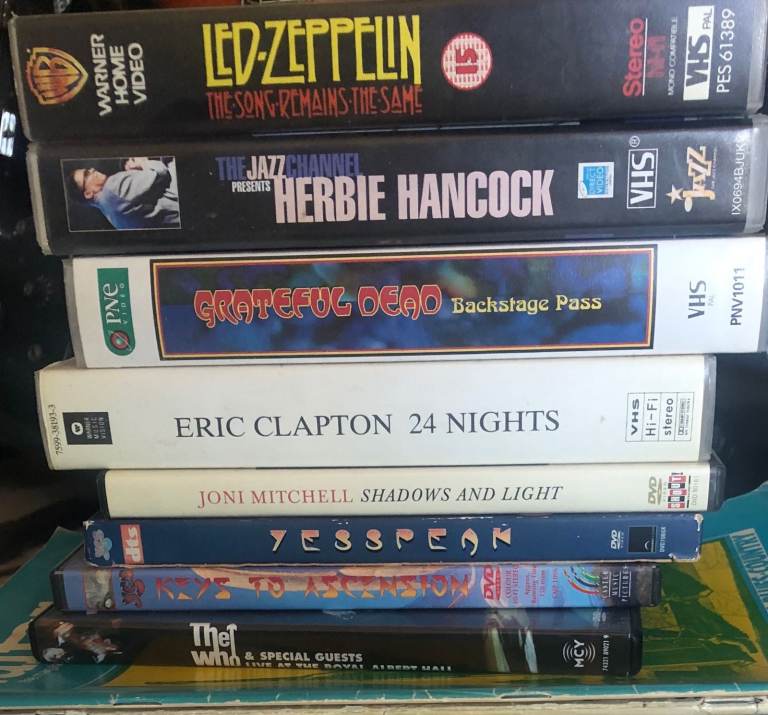 MUSIC DVDS/VHS AND A STACK OF GUITAR & BASS MAGAZINES
