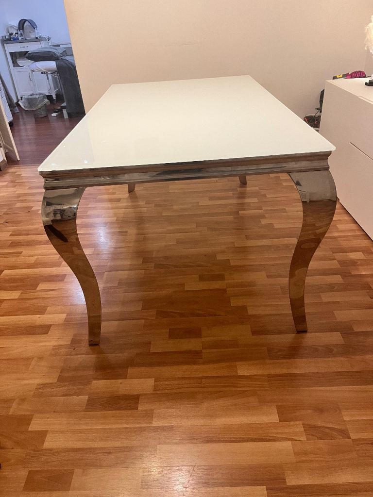 Next glass dining table