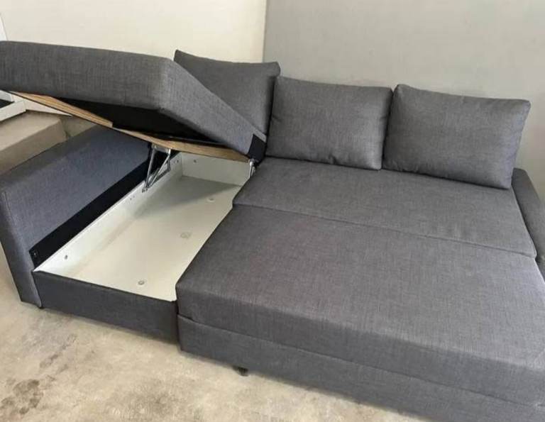 IKEA Friheten sofa bed with ottoman storage. 