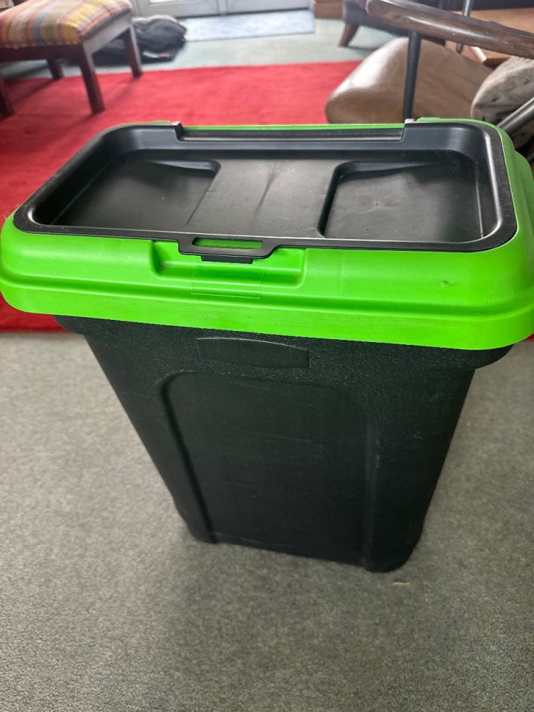 Large pet food container with scoop in lid