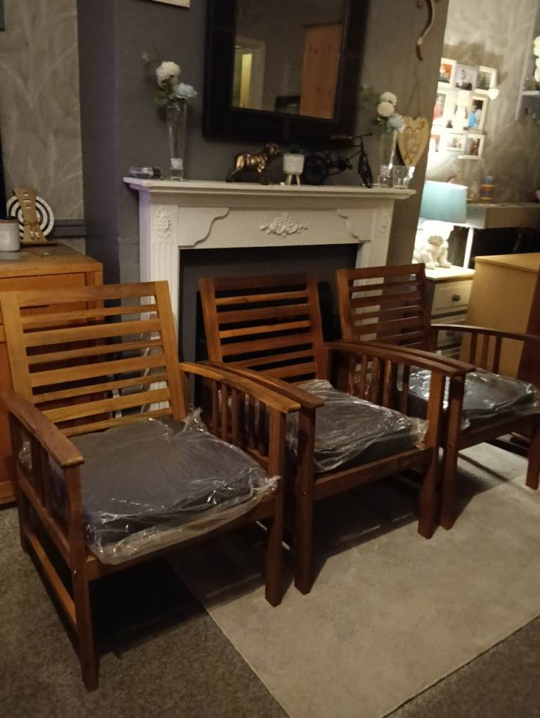 Three new hardwood garden chairs with cushions feel free to contact me 