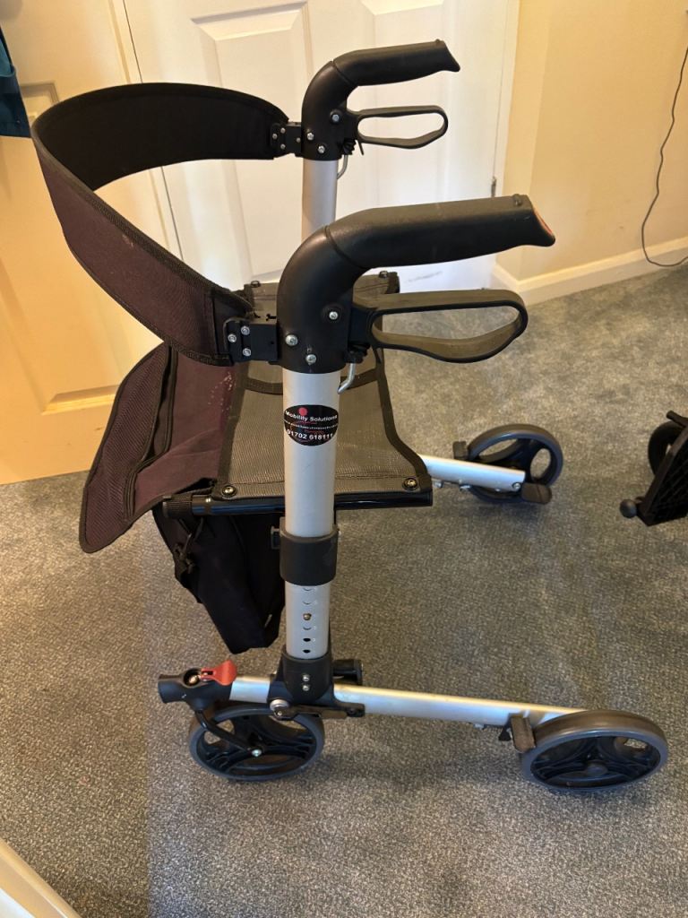 Mobility Walker with Seat and Wheels – Good Condition.  Folds down for storage/travel