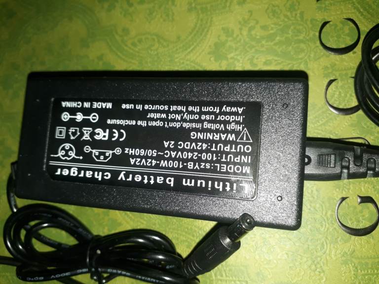 SCOOTER BRAND NEW 42 VOLTS 2AMP CHARGER BRAND NEW 