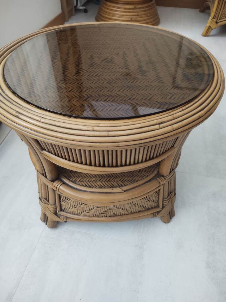 Rattan style table with glass top 