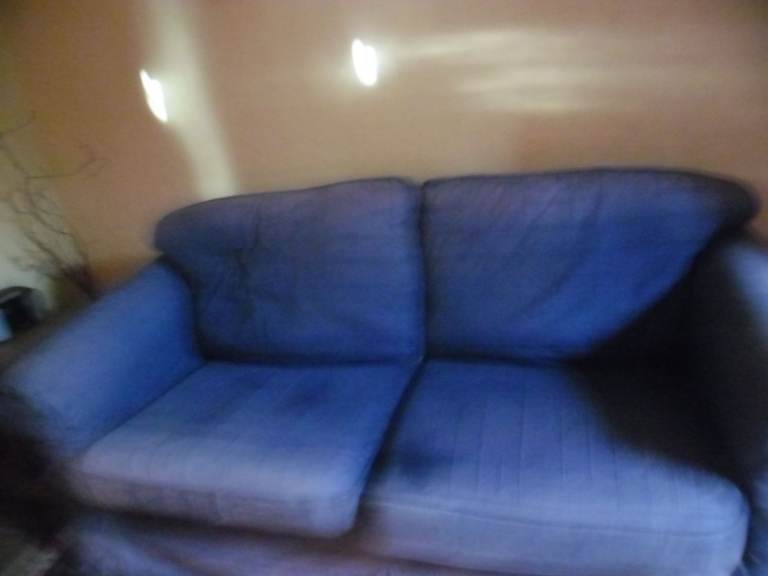 Large very comfortable blue Shabby Chic three-seater sofa with loose covers