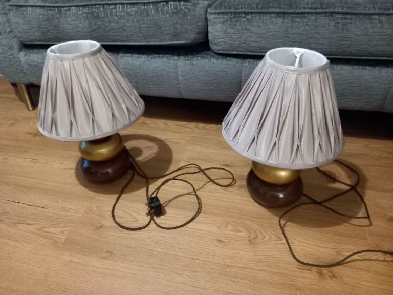 2 decorative brown lamps with shades