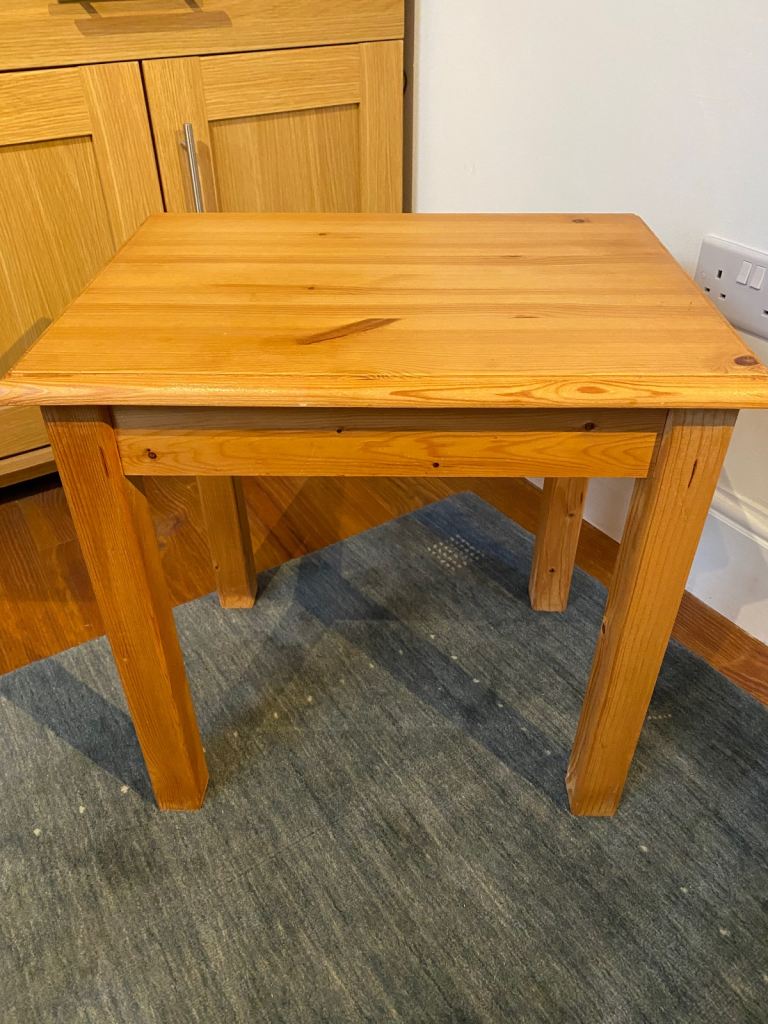Solid pine side table in excellent condition. 