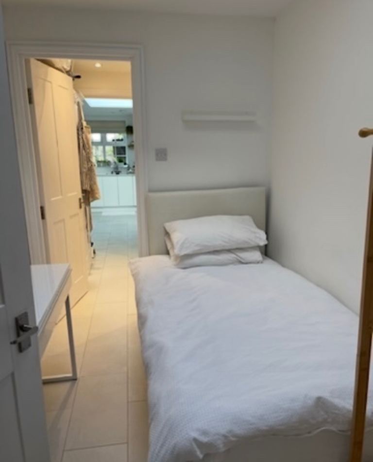 Very small single bedroom to share with family 