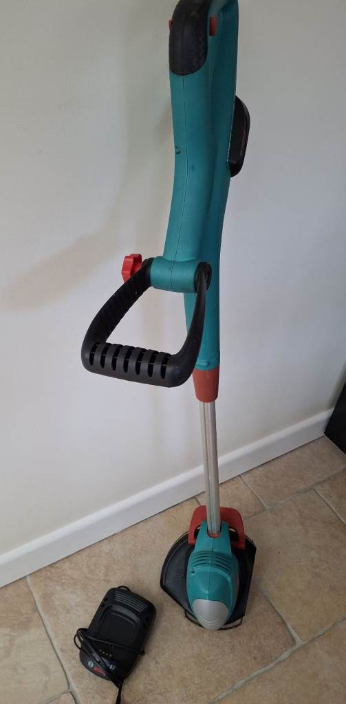 Bosch ART 23L1 Cordless Strimmer. Adjustable. Full  kit. Spare blades, Charger, Instruction book