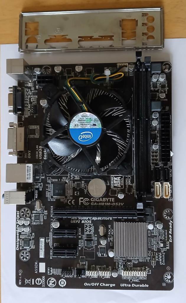 Gigabyte GA-H81M-DS2V motherboard with i/o shield backplate + i3 + cooler