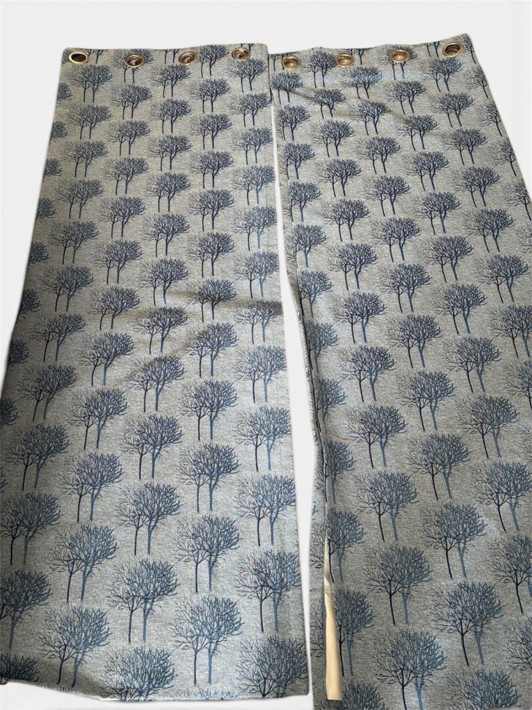 Pair of Grey Fabric Eyelet Curtains with Blue Tree Pattern