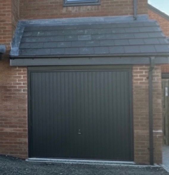 Black Metal garage door Hormann