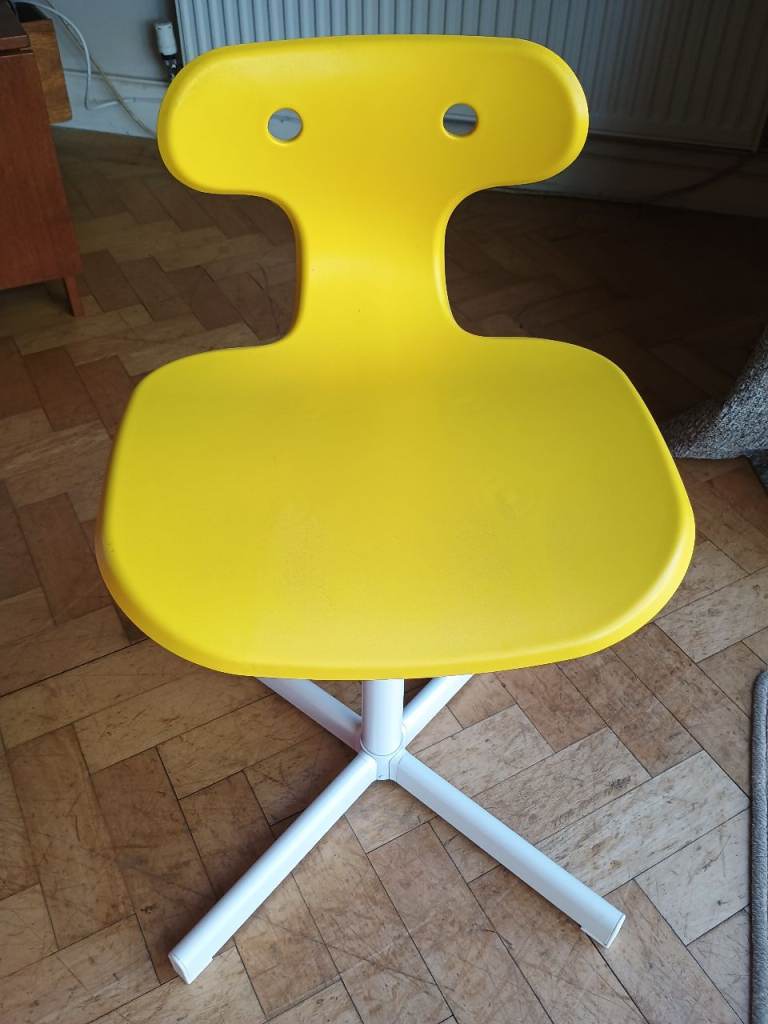 Yellow IKEA kids desk chair 