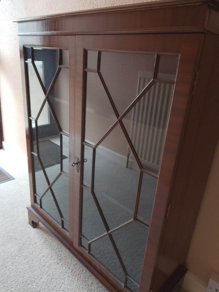 Wooden Display Cabinet with Glass Doors and Decorative Panes