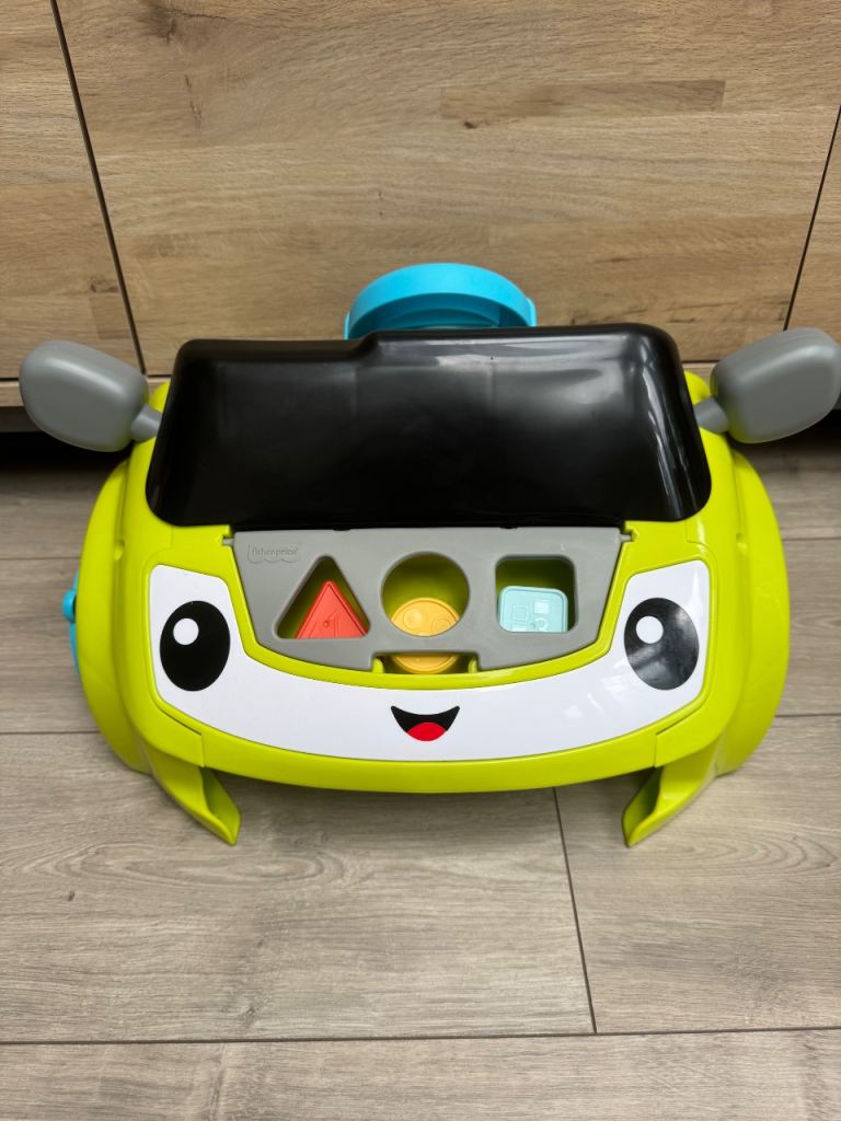 Fisher-Price Laugh & Learn Sit & Steer Driver Activity Toy
