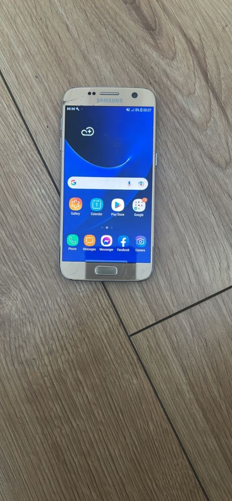 Samsung galaxy s7 mobile phone - 32gb - works fine - some minor screen damage 