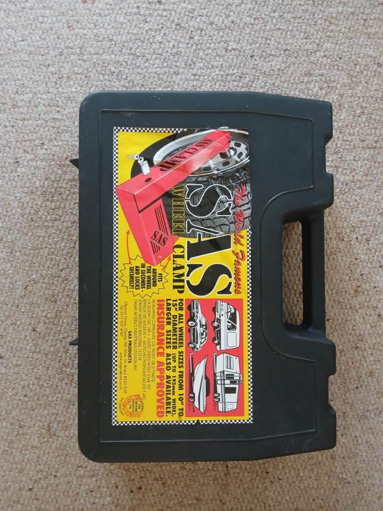 SAS WHEEL CLAMP FOR 10 INCH TO 15 INCH WHEELS .     £70 .00